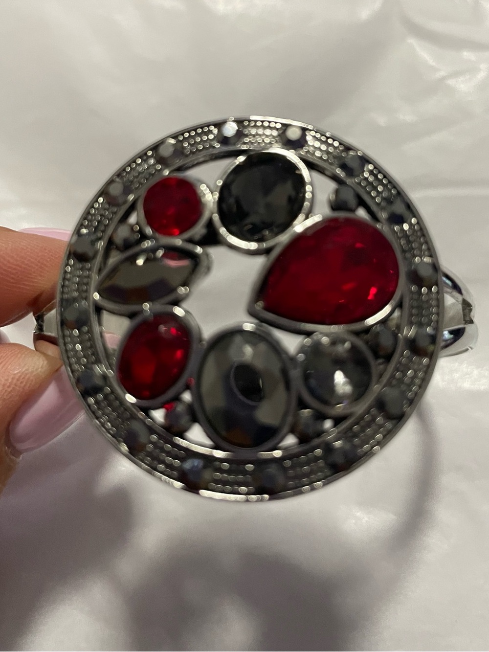 Elegant Women's Silver-Tone Bracelet with Red and Black Gem Accents